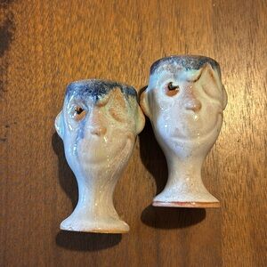 Vintage pair of head, face shot glasses signed glazed pottery